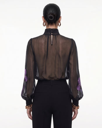 Blusa trasparente a collo alto con stampa Iris - Nero/Viola