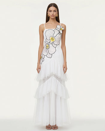 Abito lungo senza spalline in tulle con volant e orchidee ricamate - Bianco