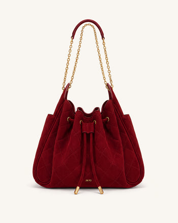 Rowan Sac seau matelassé à chaîne en faux suède - Rouge foncé