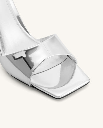 Sabot con tacco in ecopelle metallizzata Hannah - Argento