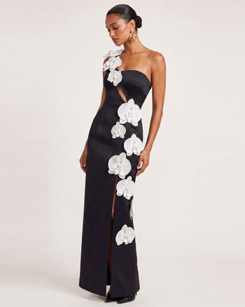 Maxi abito con spacco, cut-out e decorazione a orchidea - Nero