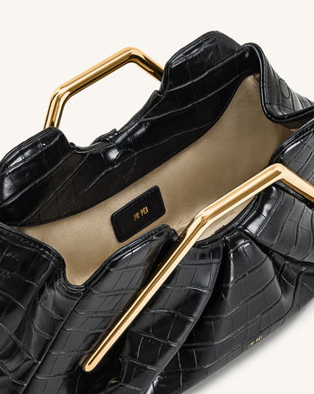 Pochette Lila in similpelle effetto coccodrillo con cornice in metallo - Nero