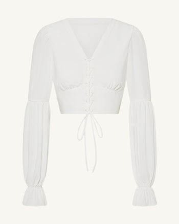 Blusa crop in chiffon con maniche a lanterna e nodo frontale - Bianco