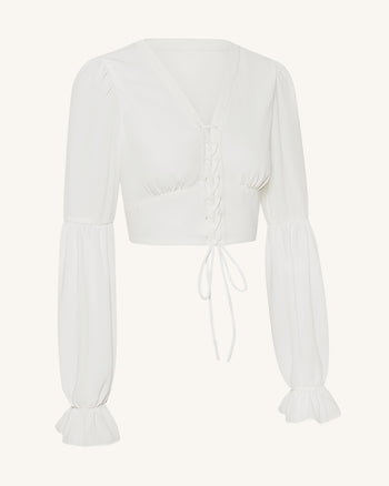 Blusa crop in chiffon con maniche a lanterna e nodo frontale - Bianco