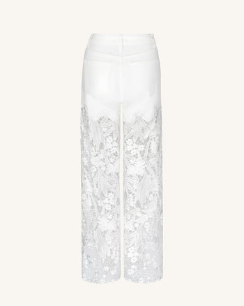 Jeans in denim bianco a vita alta con gamba ampia, ricami in pizzo e strass
